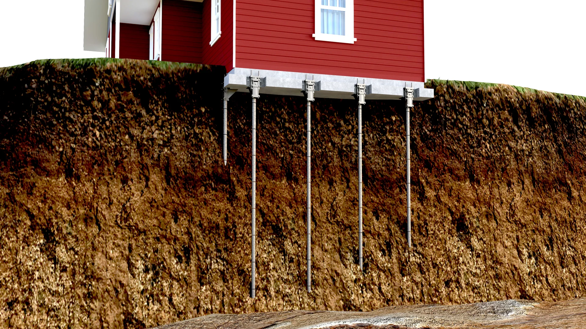 Push piers driven beneath a settling foundation footing to load bearing strata
